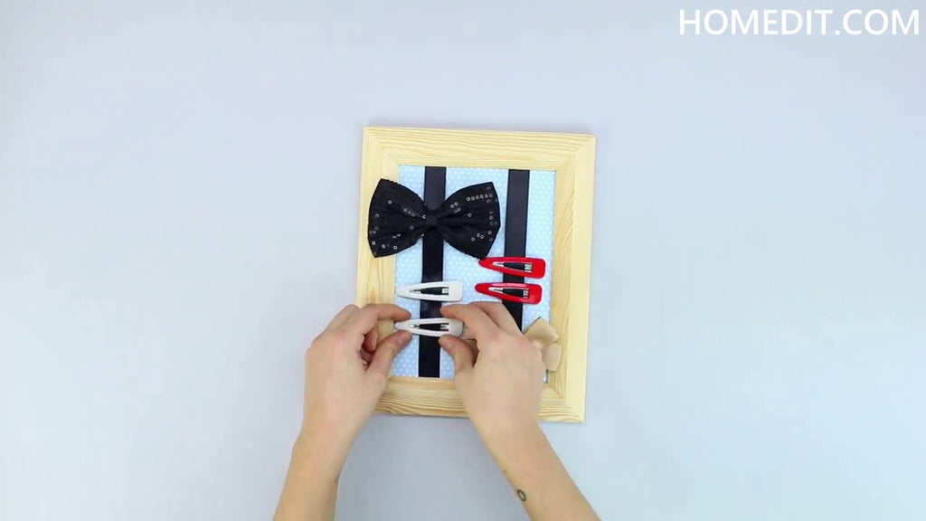 Have a drawer full of jumbled hair clips and accessories? This quick-to-make hair accessory organizer will keep them tidy and be a stylish display.