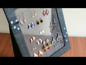 This is a very simple idea to have a earring organizer with just cardboard, glue and a net