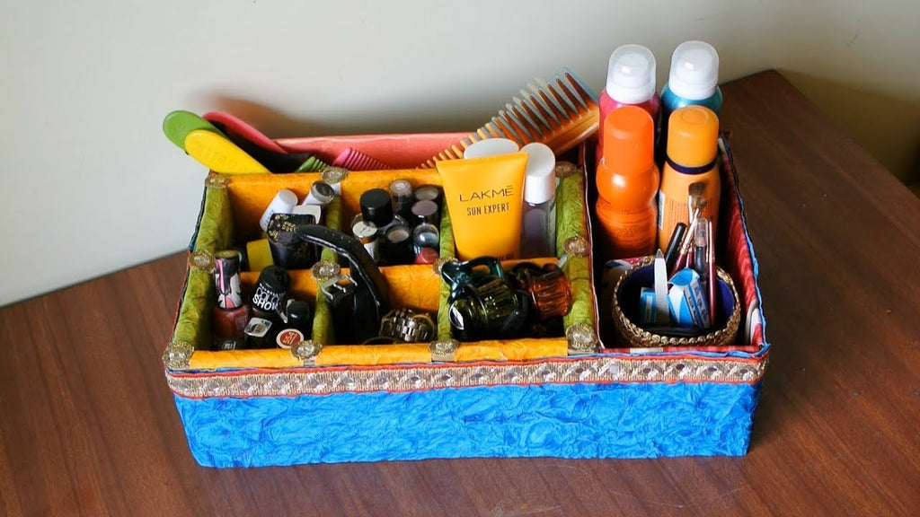 Materials used - waste cardboard boxes, waste packing material, handmade paper sheets, glue, fancy lace ribbons, fabric glue, clips, waste tin box Make use of ...