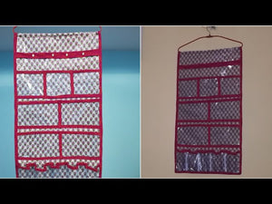 This video is about making multi purpose wardrobe and accessories organizer from waste cloth